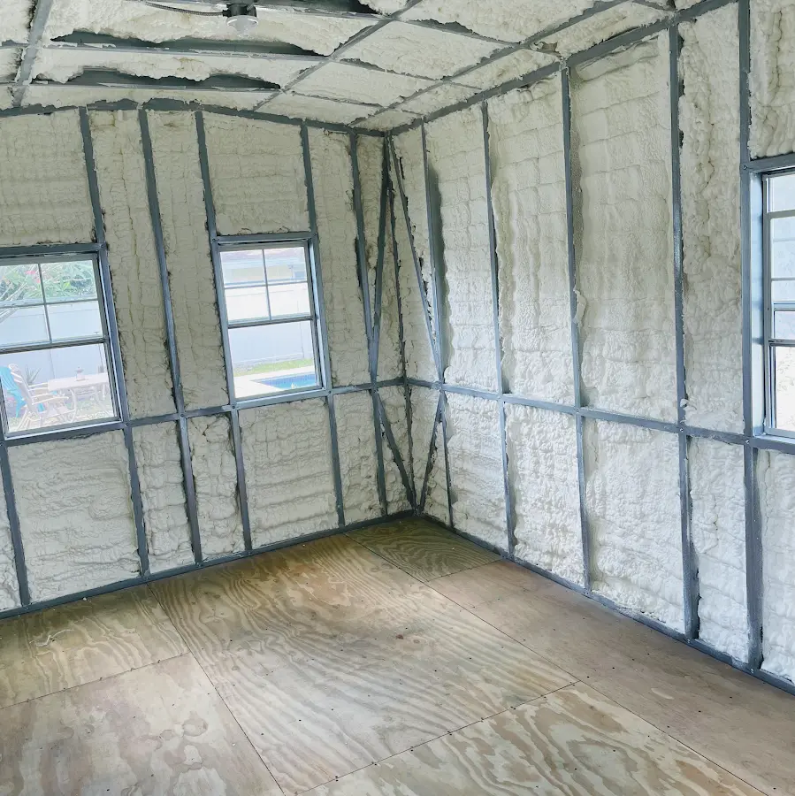 Closed-cell spray foam insulation applied to wall cavities in a residential project in Hackettstown